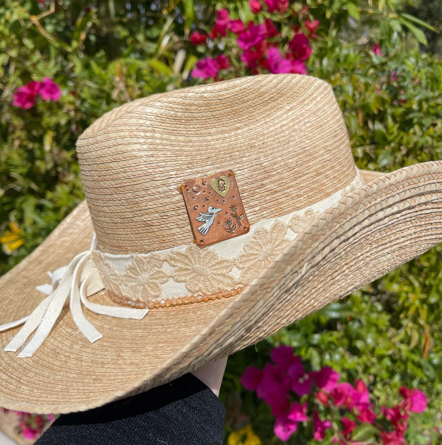 Decorative straw hat in garden setting