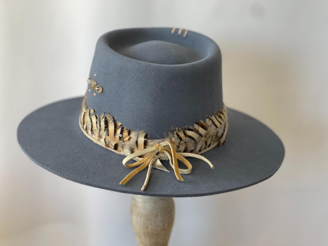 Gray felt wide-brim hat with feather band