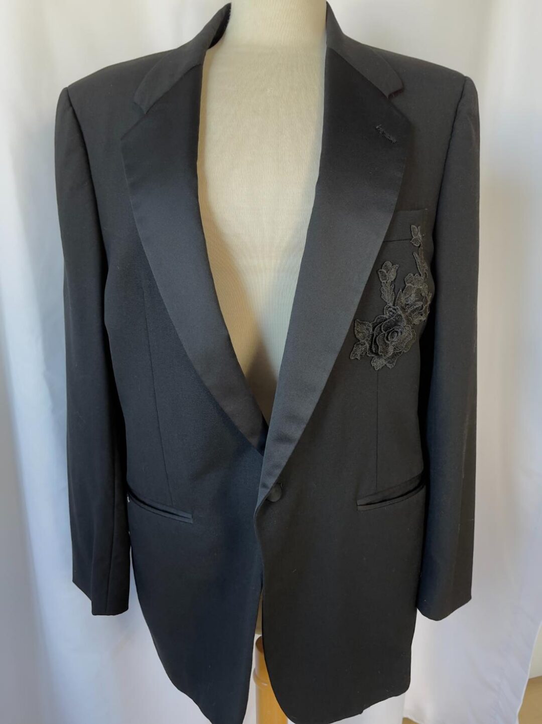 Black satin-lapel tuxedo jacket with floral embroidery